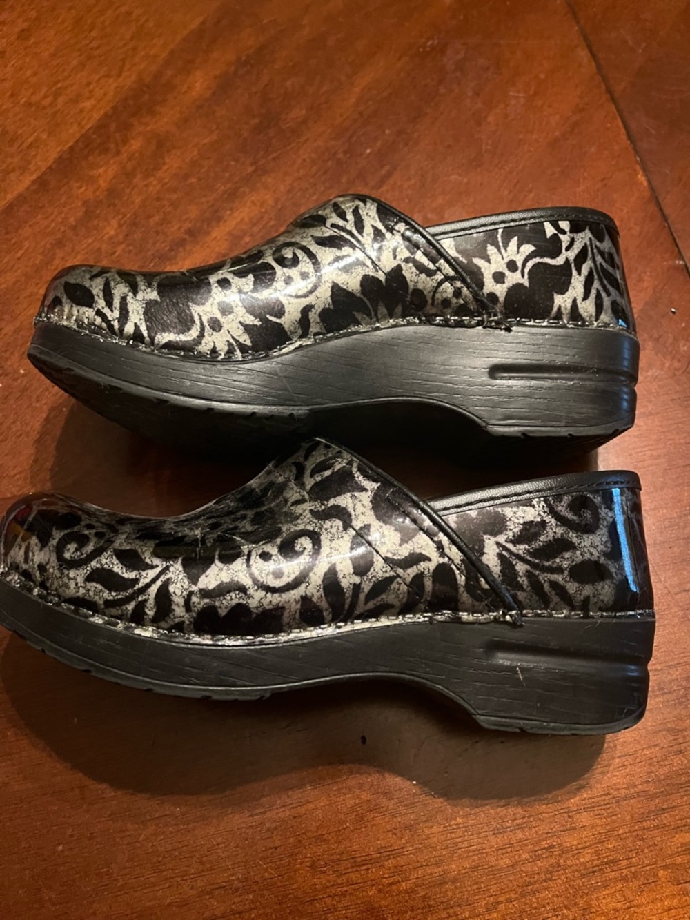 Dansko Black and Silver Floral Patent Clogs with Metallic Accents - Picture 3 of 7